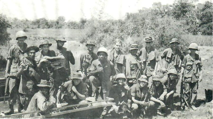 Harold McDonald can be seen seated in the front row, first on the right